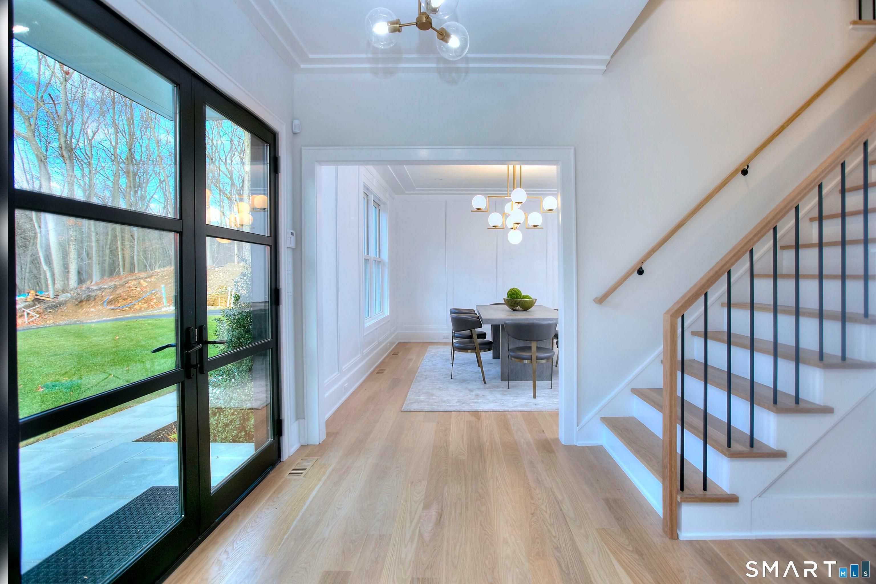 20 Fresenius Road Westport, CT 06880 - Photo 2 of 18 a view of an entryway with wooden floor