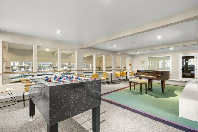 a view of a living room and dining room