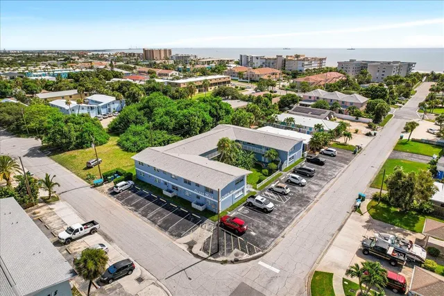 an aerial view of a house with an outdoor space