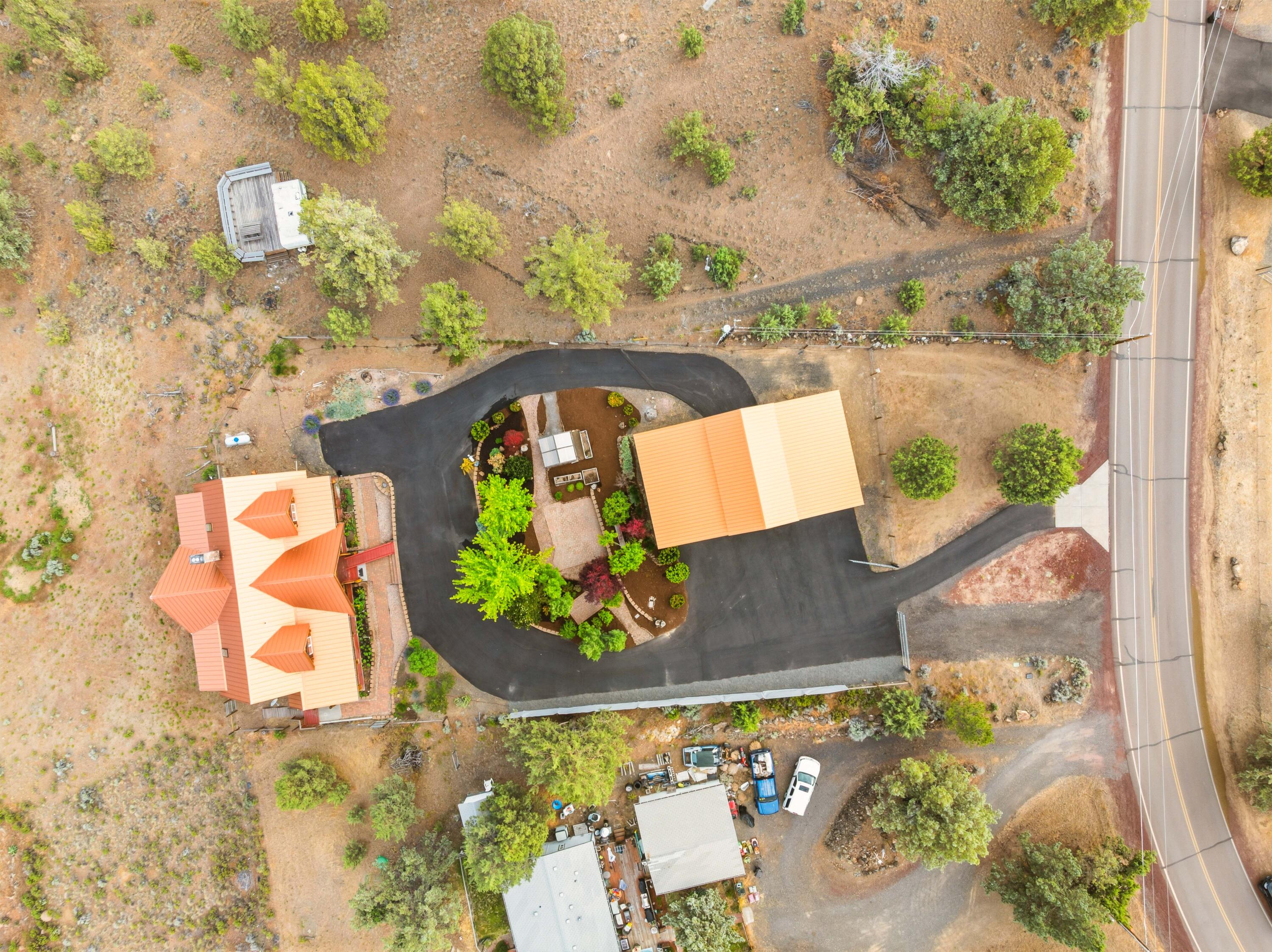 10739 Southwest Shad Road Terrebonne, OR 97760 - Photo 54 of 55 an aerial view of a house with a yard and a lake view