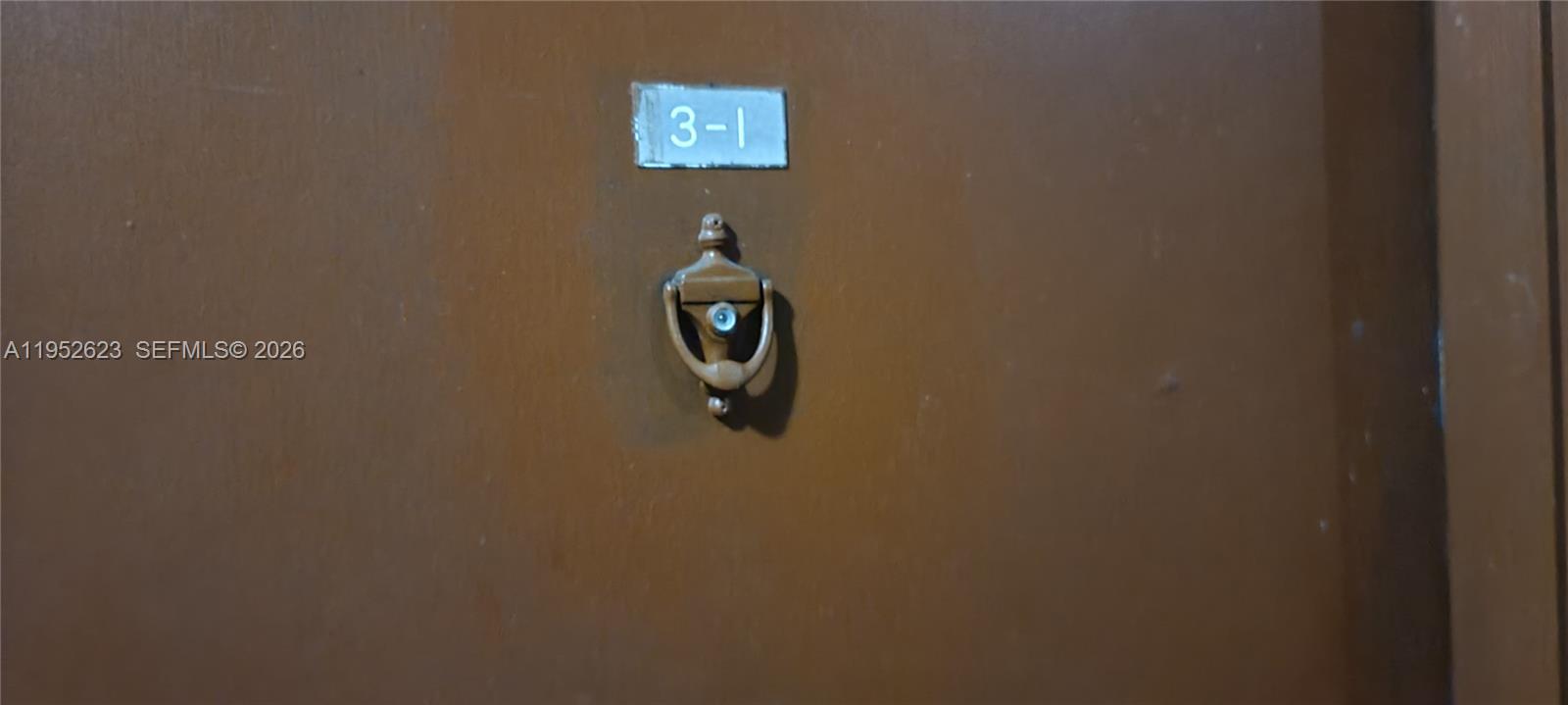 10641 Southwest 108th Avenue, Unit 3I Miami, FL 33176 - Photo 2 of 16 a close up of a wall with a painting on it