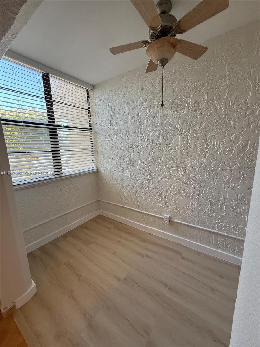 10641 Southwest 108th Avenue, Unit 3I Miami, FL 33176 - Photo 24 of 25 a view of an empty room with a window