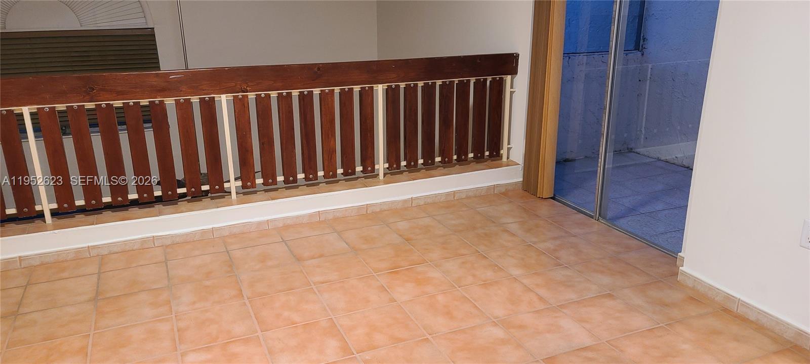 10641 Southwest 108th Avenue, Unit 3I Miami, FL 33176 - Photo 9 of 16 a view of a wooden door