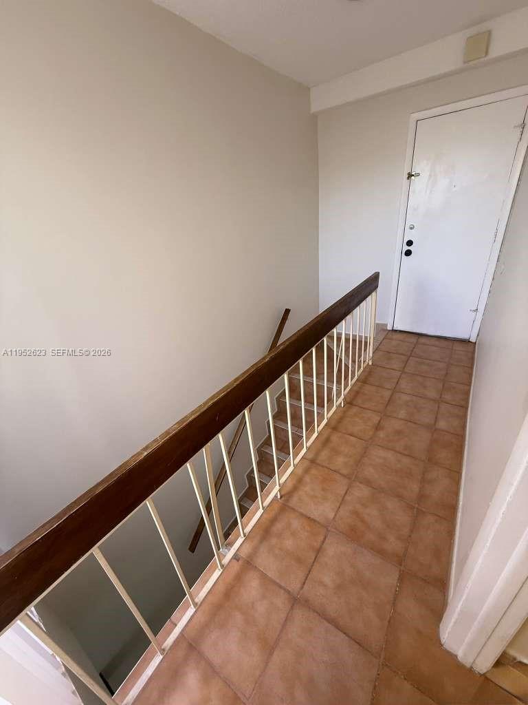 10641 Southwest 108th Avenue, Unit 3I Miami, FL 33176 - Photo 9 of 25 a view of wooden floor
