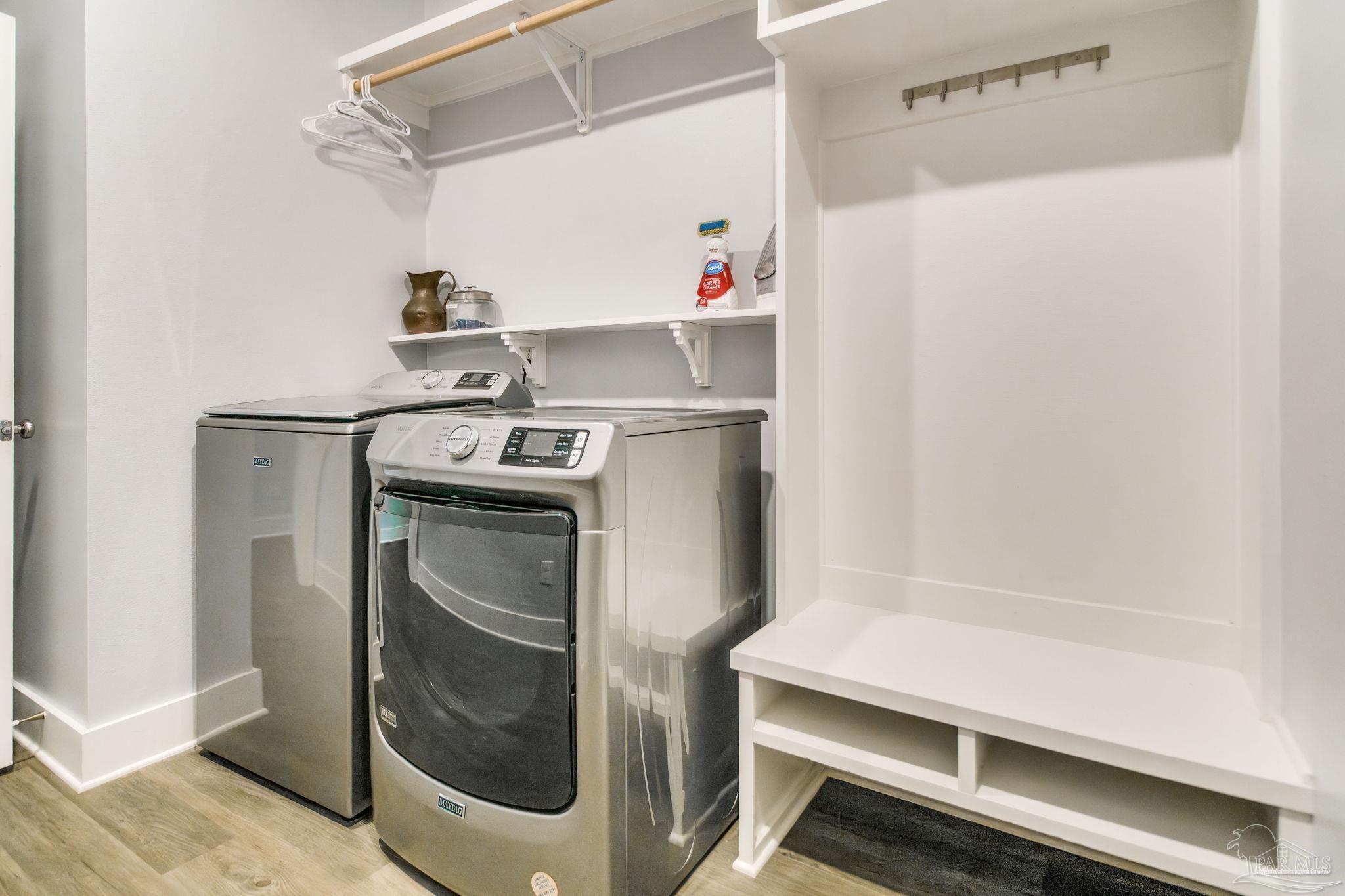8245 Verano Street Navarre, FL 32566 - Photo 11 of 72 a utility room with dryer and washer