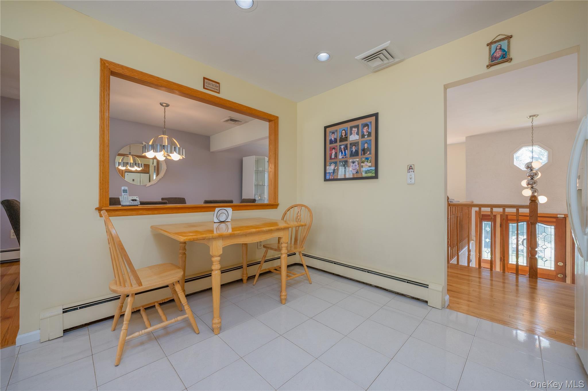 196 East Townline Road West Nyack, NY 10994 - Photo 11 of 35 a dining room with furniture and wooden floor