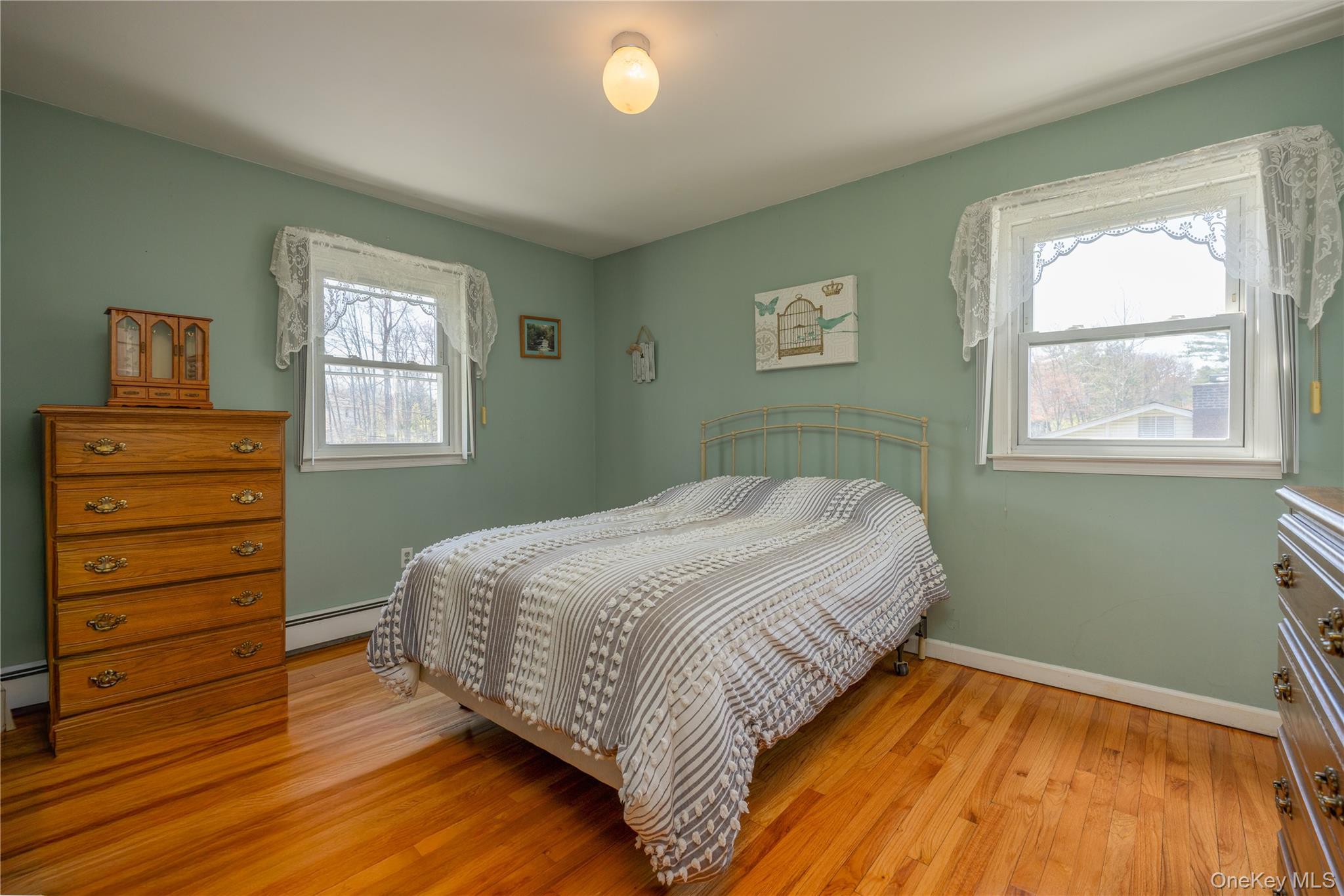 196 East Townline Road West Nyack, NY 10994 - Photo 19 of 35 a bedroom with a bed and a dresser