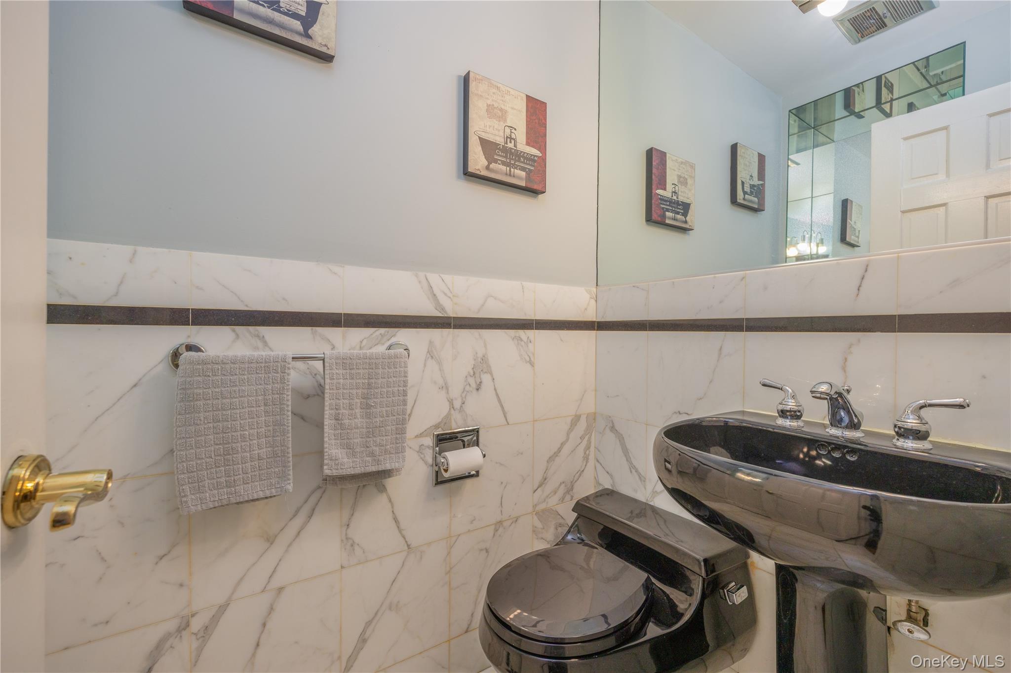 196 East Townline Road West Nyack, NY 10994 - Photo 20 of 35 a bathroom with a sink and a toilet