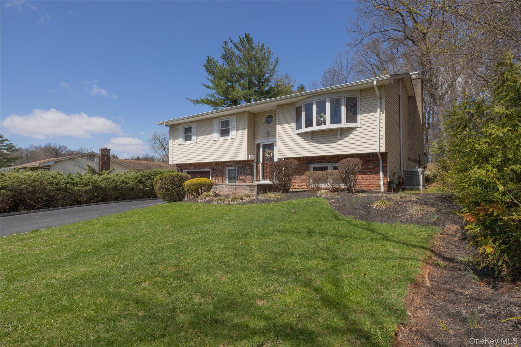 196 East Townline Road West Nyack, NY 10994 - Photo 2 of 35 a front view of house with yard and green space