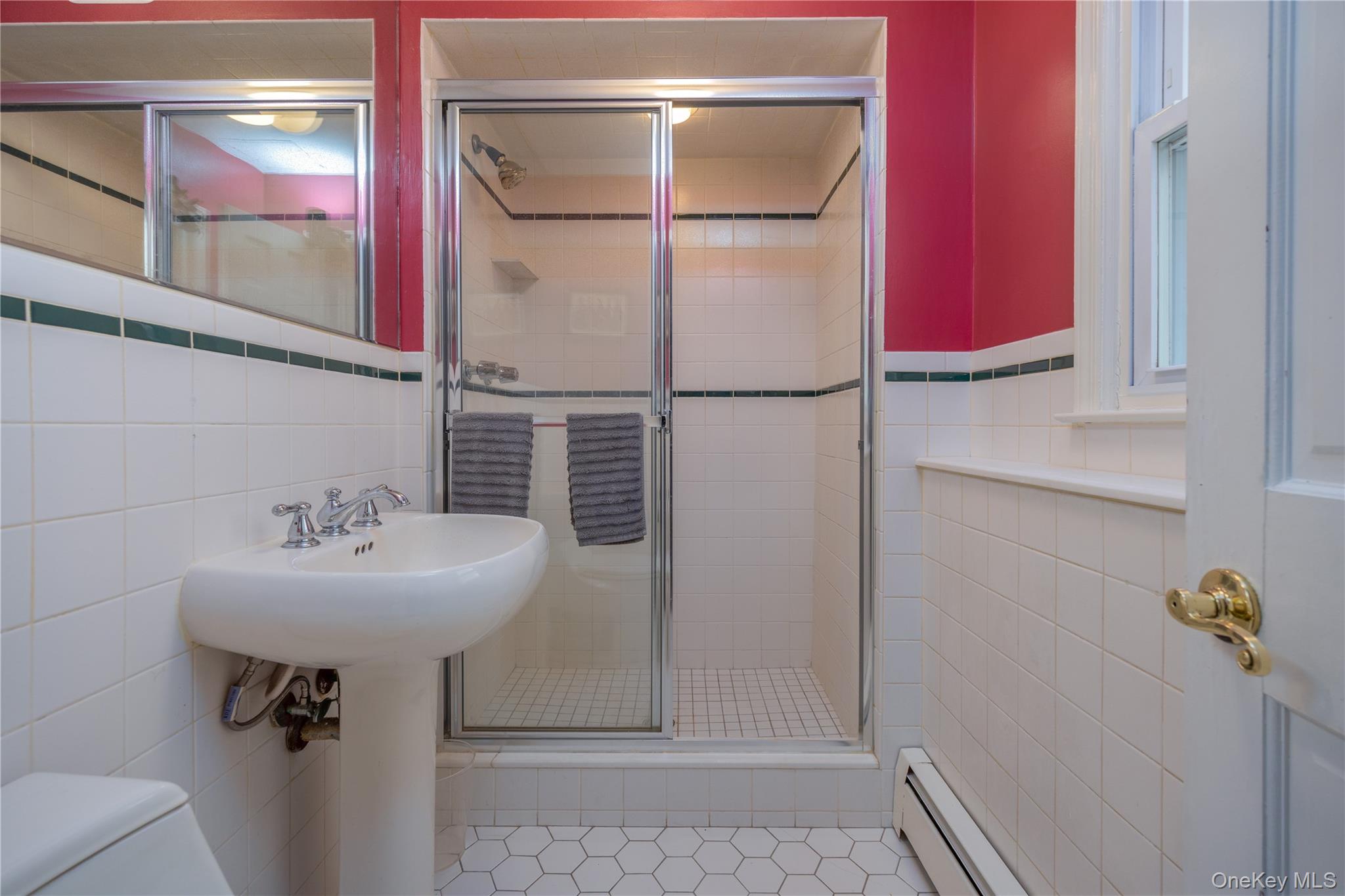 196 East Townline Road West Nyack, NY 10994 - Photo 22 of 35 a bathroom with a sink and mirror