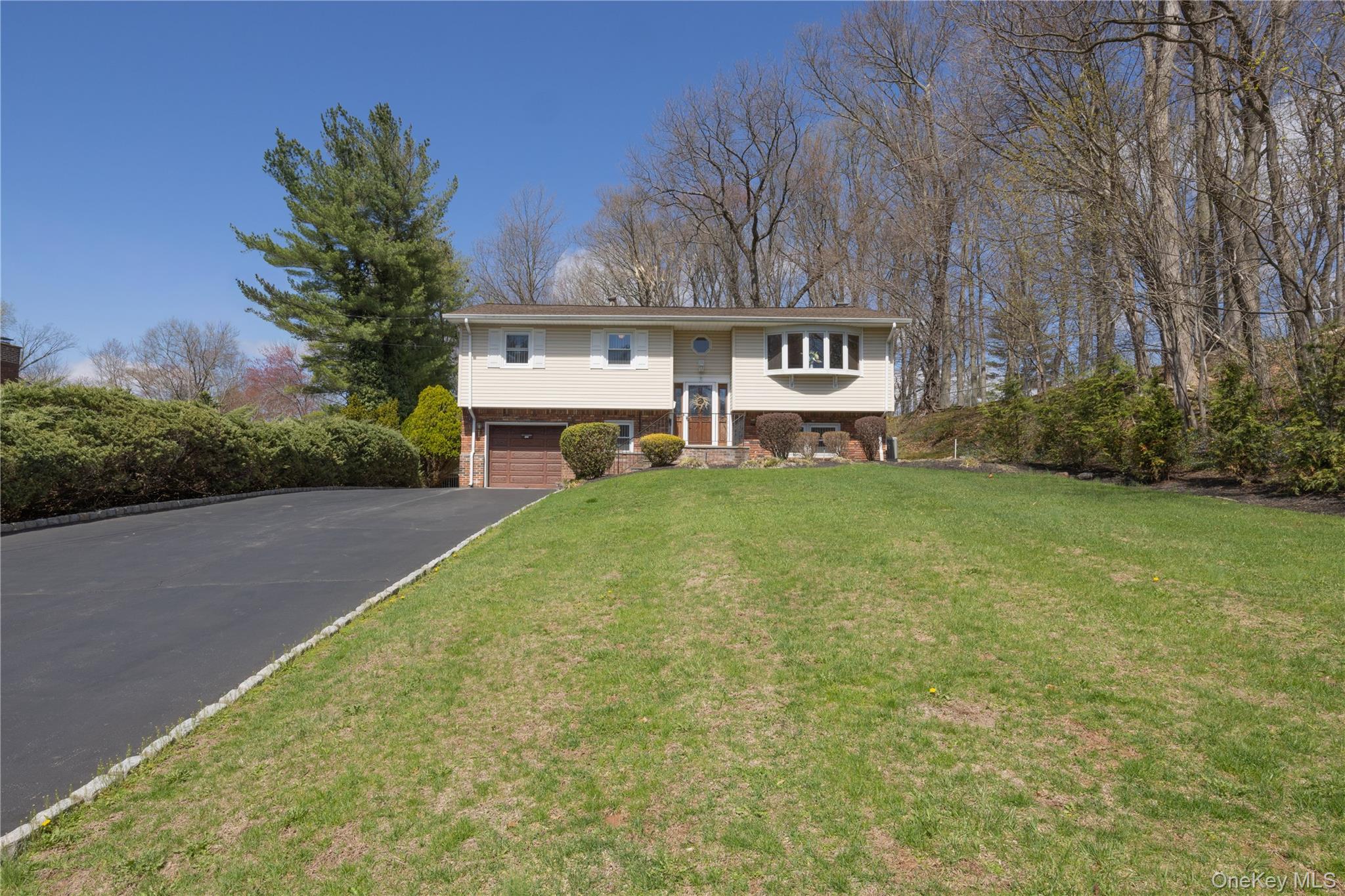 196 East Townline Road West Nyack, NY 10994 - Photo 35 of 35 a view of a house with a yard and sitting area