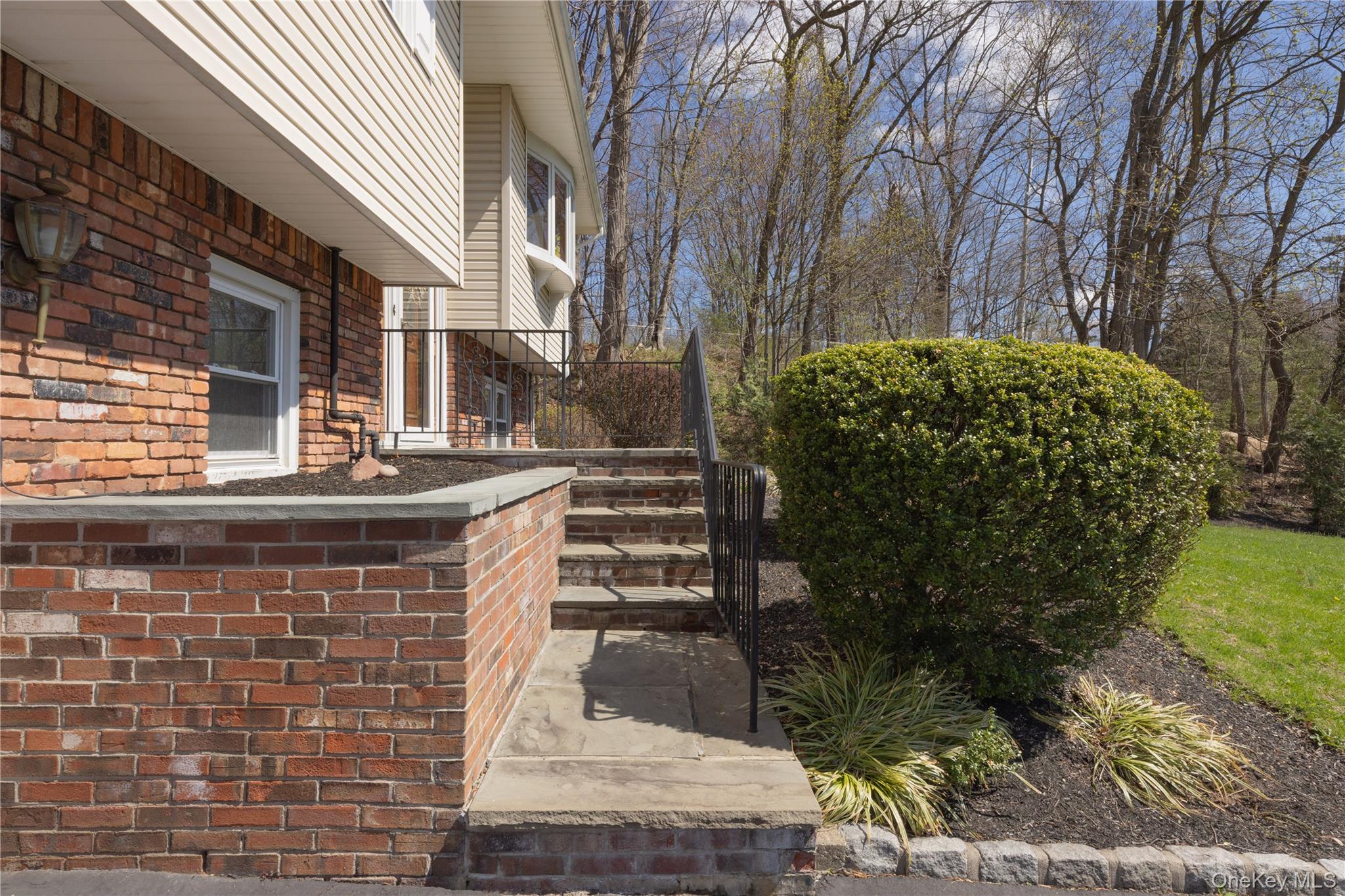 196 East Townline Road West Nyack, NY 10994 - Photo 4 of 35 a front view of a house with garden