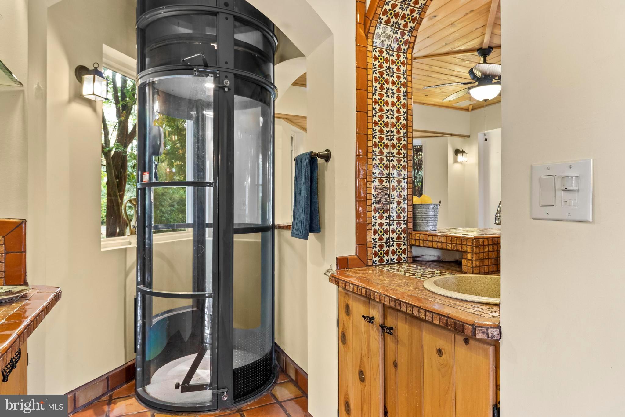 12330 Potomac View Road Newburg, MD 20664 - Photo 17 of 85 a bathroom with a double vanity sink and mirror