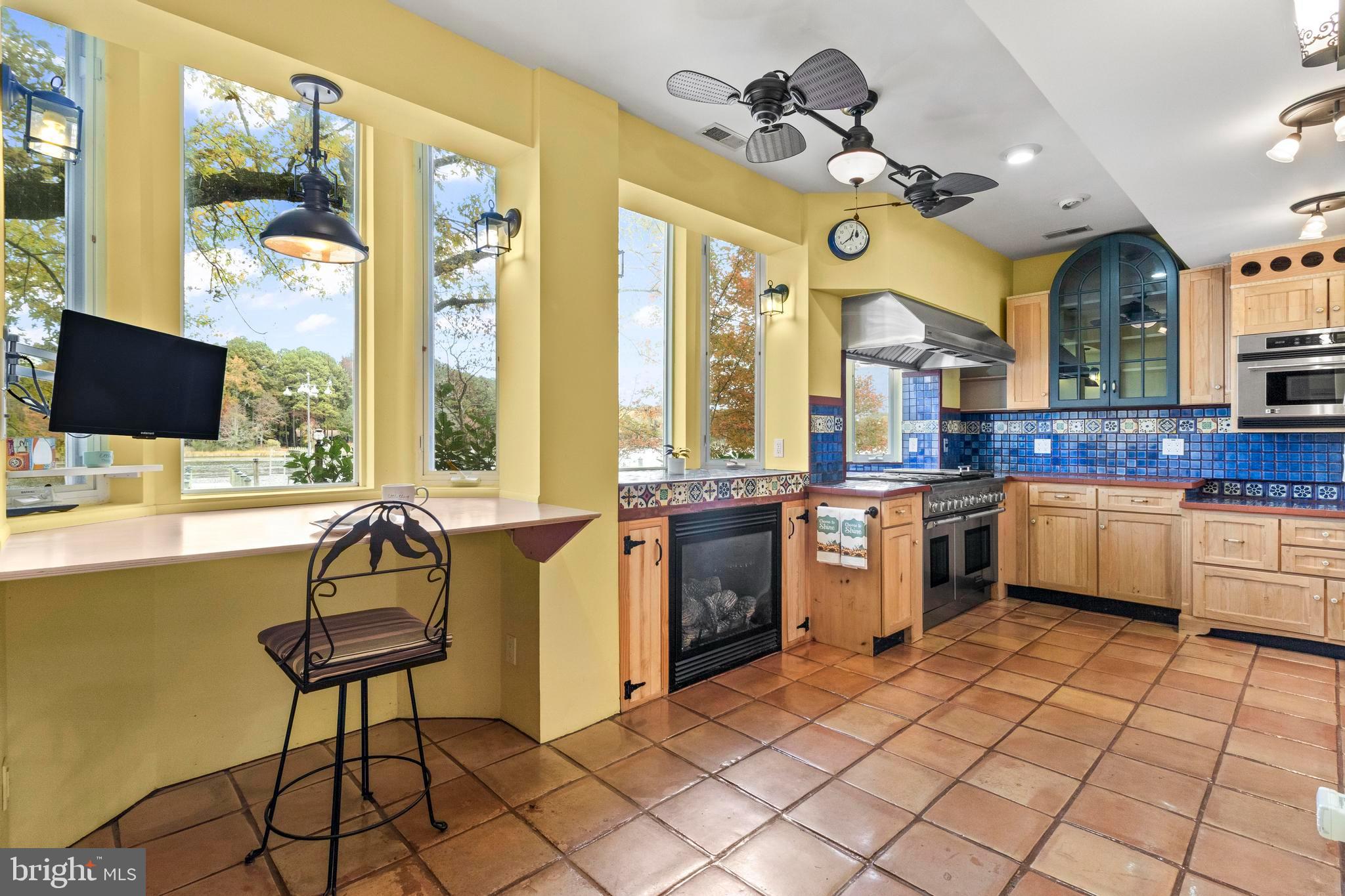 12330 Potomac View Road Newburg, MD 20664 - Photo 20 of 85 a kitchen with a sink a counter top space and stainless steel appliances