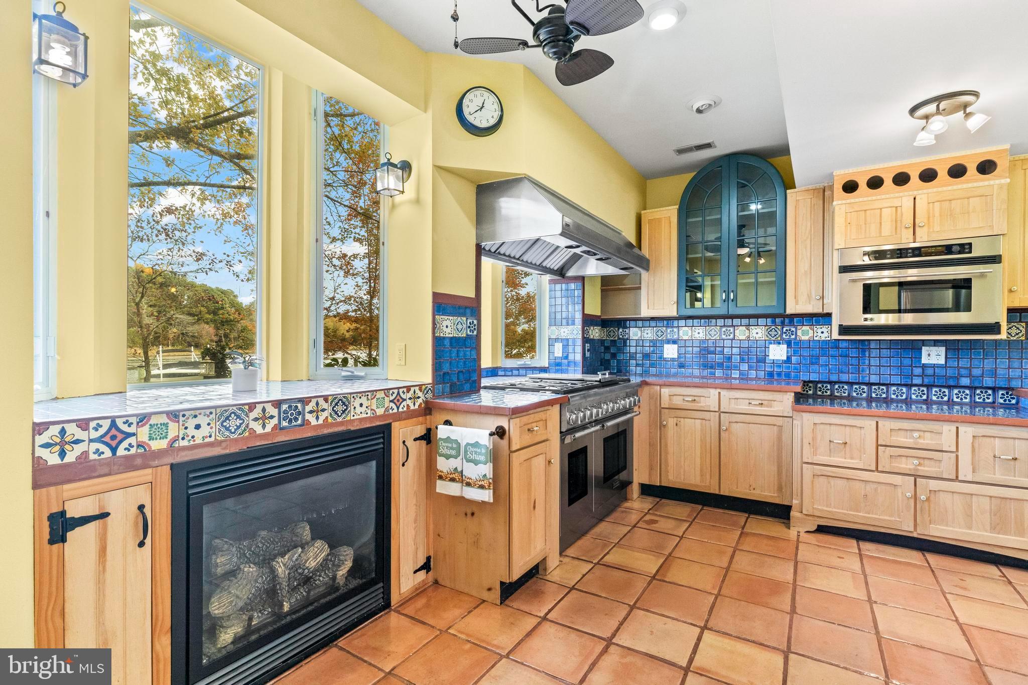12330 Potomac View Road Newburg, MD 20664 - Photo 21 of 85 a kitchen with stainless steel appliances granite countertop a stove and a sink