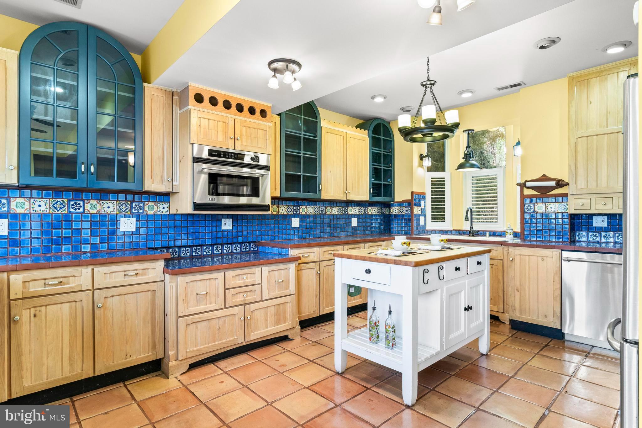 12330 Potomac View Road Newburg, MD 20664 - Photo 22 of 85 a kitchen with stainless steel appliances a stove sink and cabinets