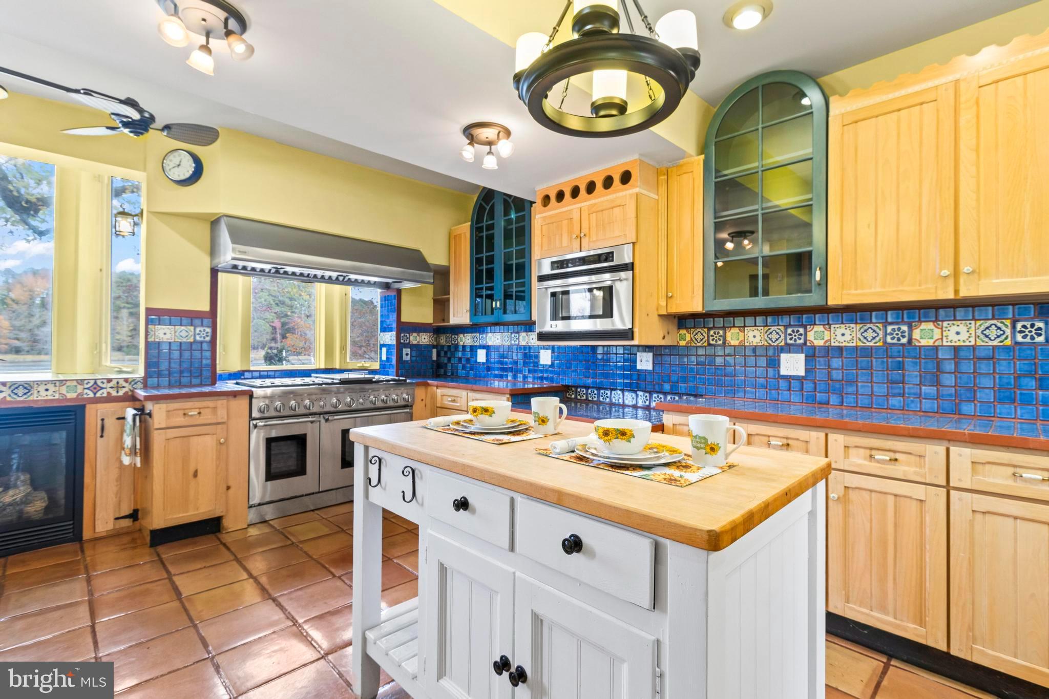 12330 Potomac View Road Newburg, MD 20664 - Photo 26 of 85 a kitchen with a stove a sink and a refrigerator