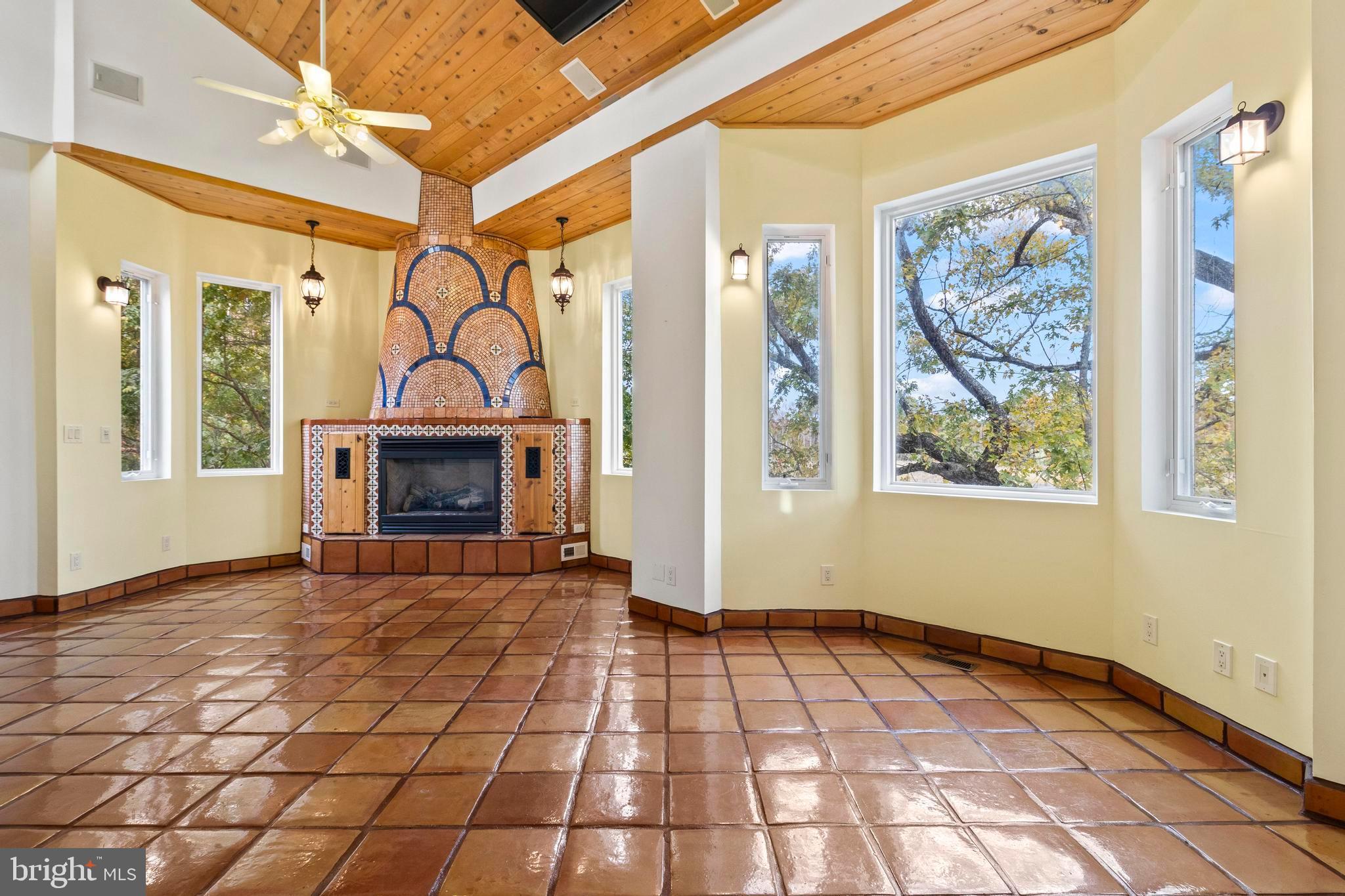 12330 Potomac View Road Newburg, MD 20664 - Photo 45 of 85 a view of empty room with window and fireplace