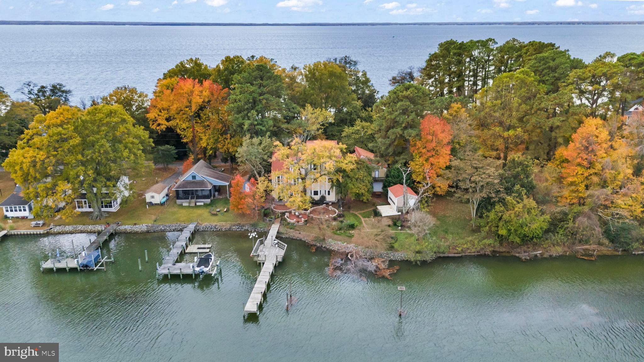 12330 Potomac View Road Newburg, MD 20664 - Photo 6 of 85 an aerial view of a house with a yard and lake view
