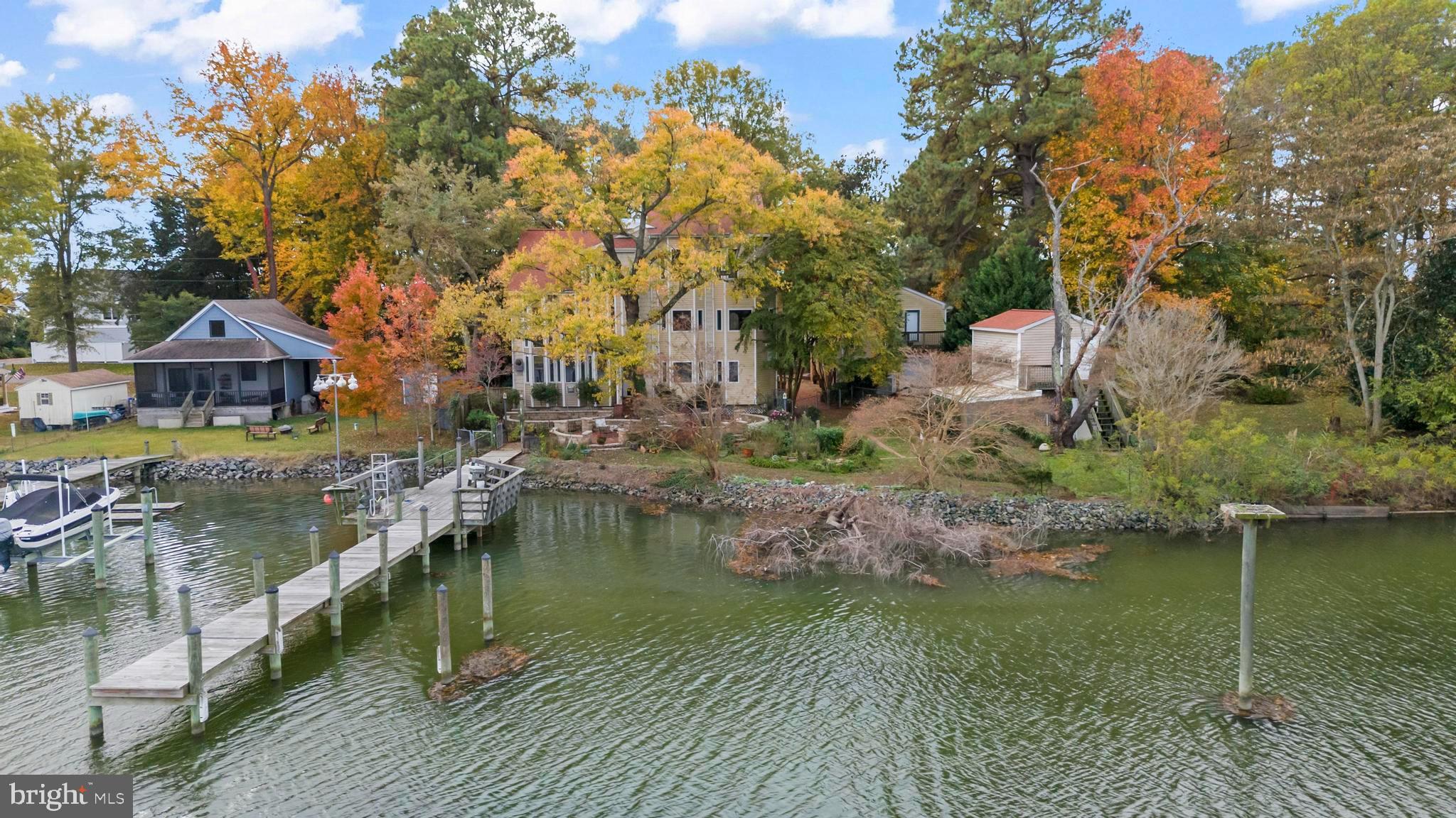 12330 Potomac View Road Newburg, MD 20664 - Photo 7 of 85 a view of a lake with houses