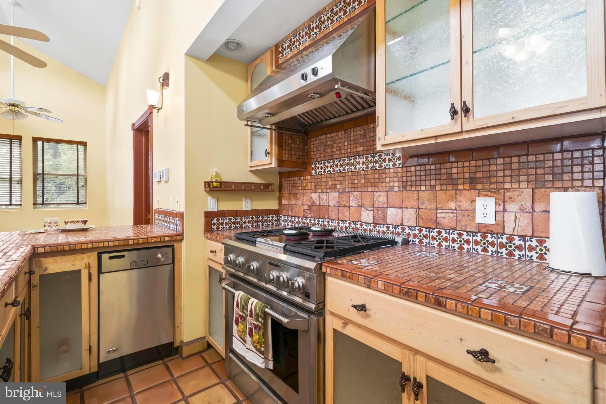 12330 Potomac View Road Newburg, MD 20664 - Photo 71 of 85 a kitchen with granite countertop a stove and a sink