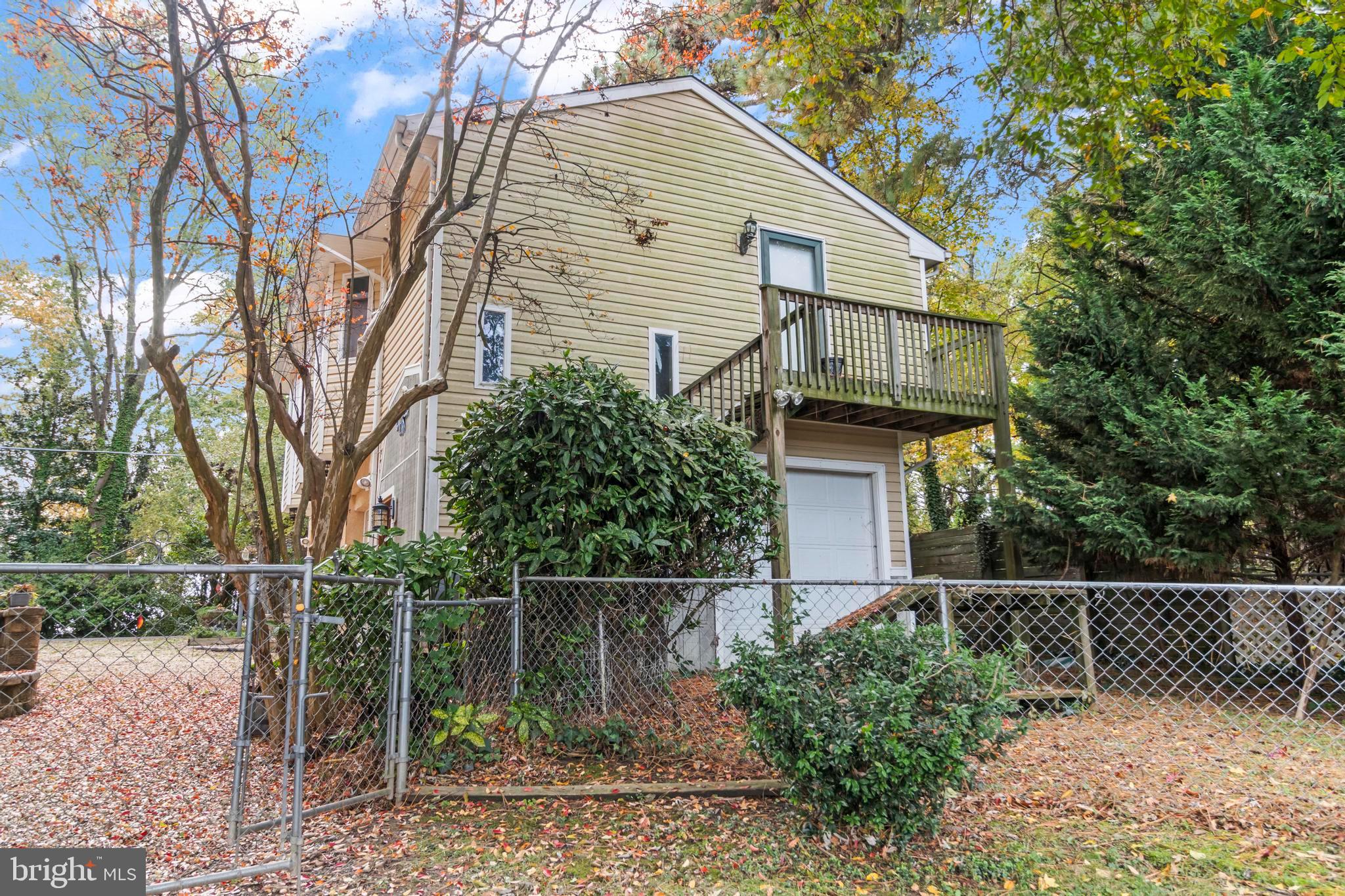 12330 Potomac View Road Newburg, MD 20664 - Photo 79 of 85 a backyard of a house with lots of green space