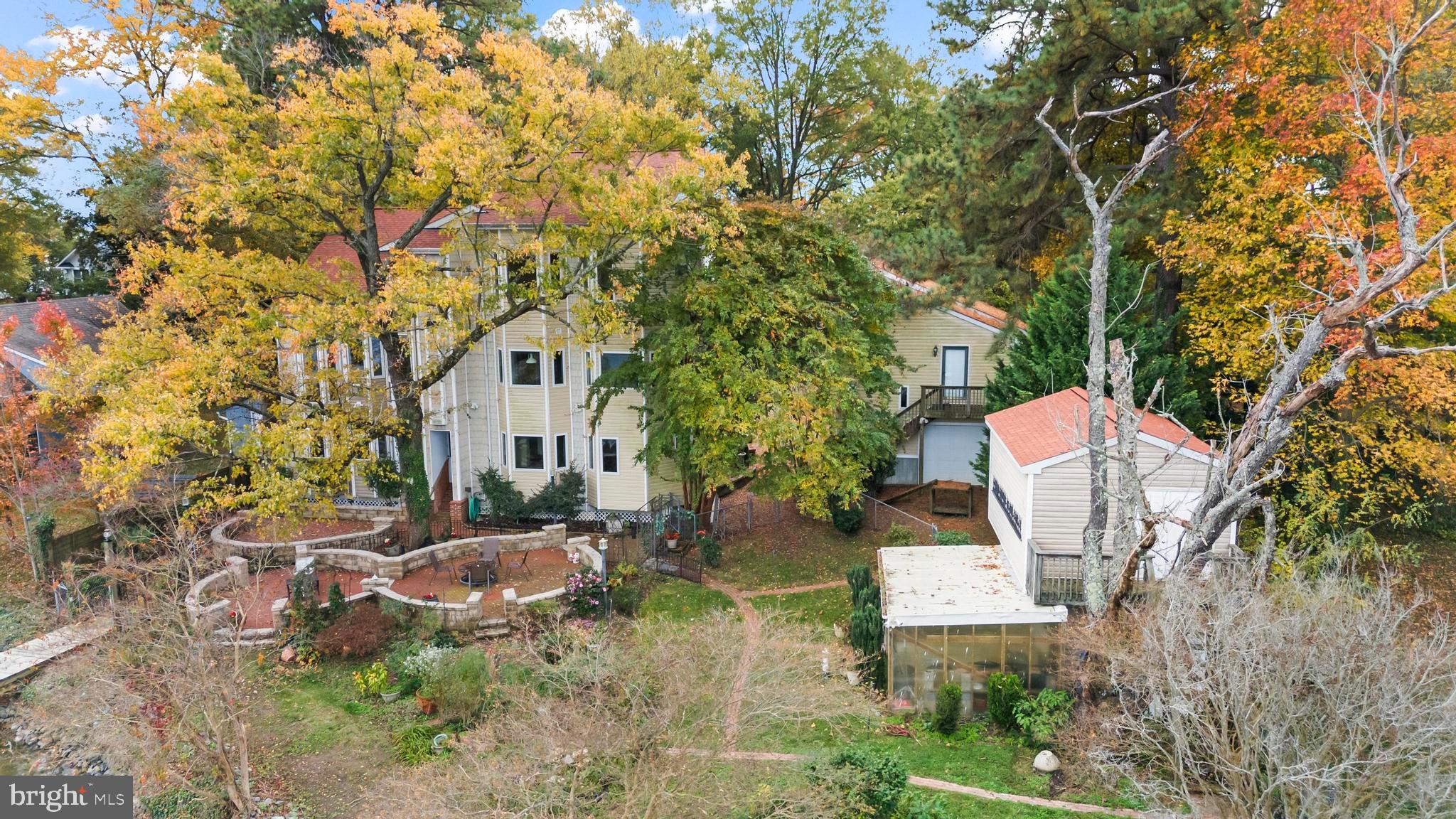 12330 Potomac View Road Newburg, MD 20664 - Photo 9 of 85 a front view of a house with a yard and trees