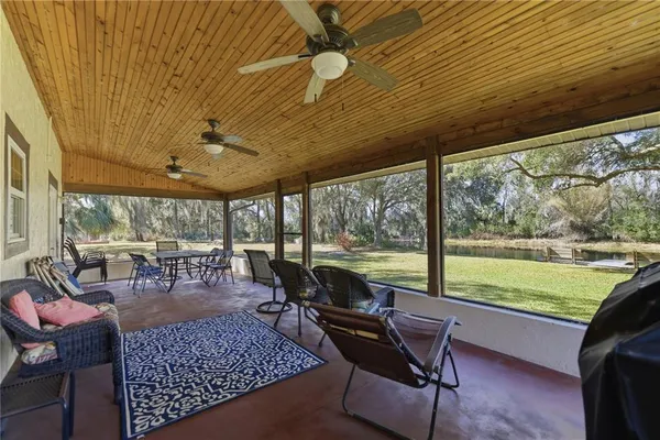 a living room with large windows