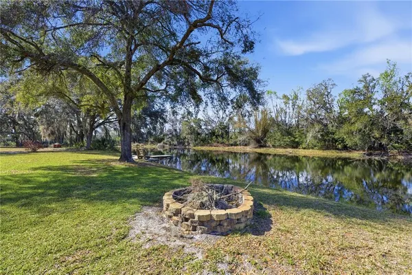 a lake view with a garden