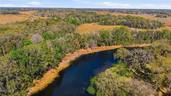 a view of lake with mountain