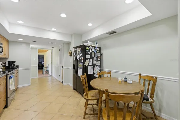 a view of a dining room with furniture