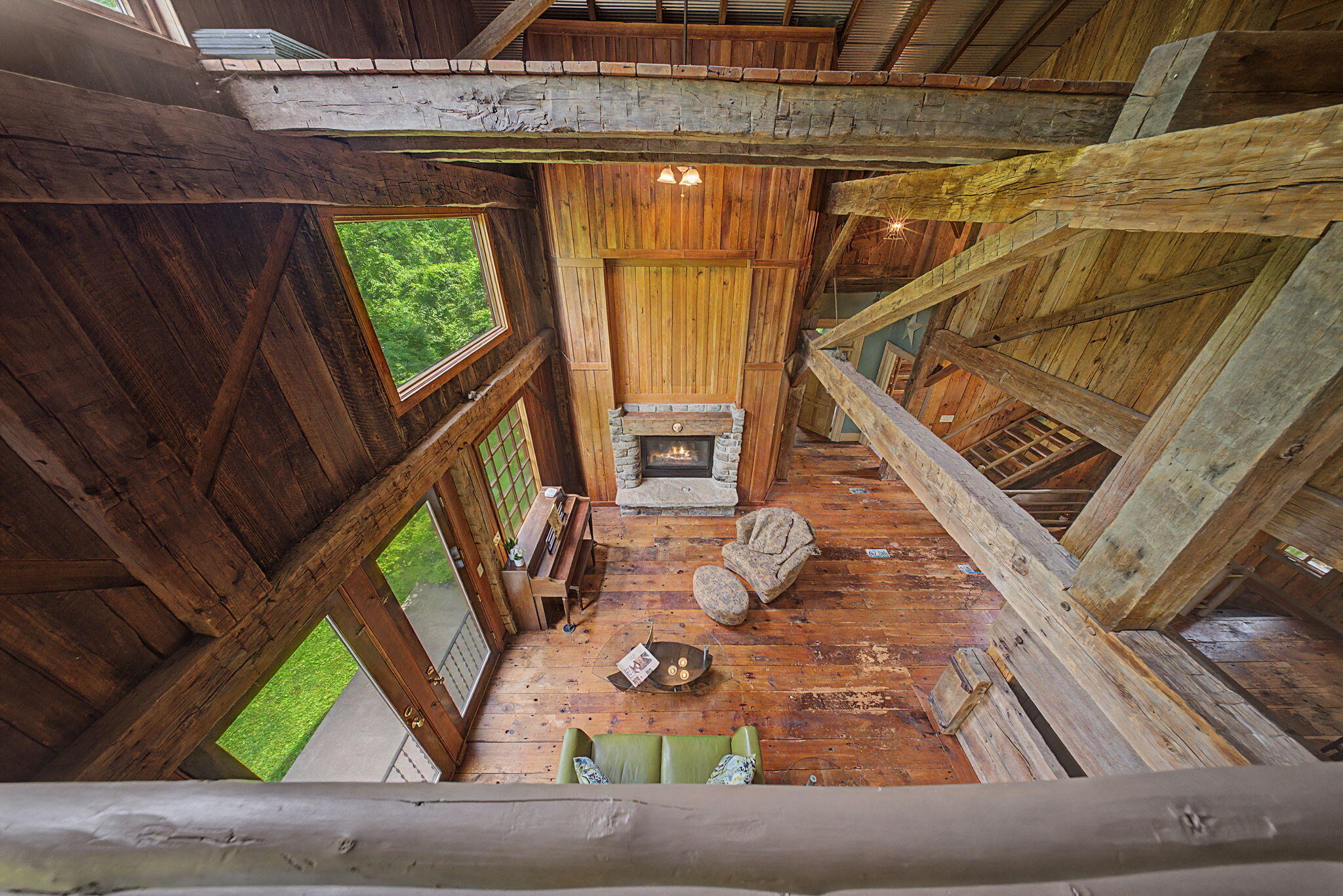 9766 Sullivan Road Union, KY 41091 - Photo 14 of 50 The loft and cat walk look down upon the cozy living room.