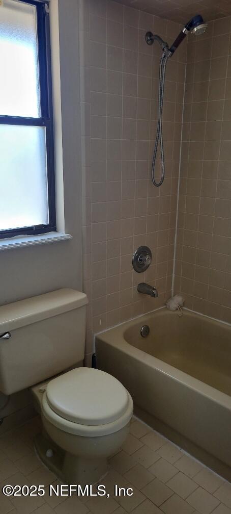 2321 Stonebridge Drive Orange Park, FL 32065 - Photo 18 of 21 a bathroom with a toilet and a shower