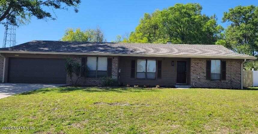 2321 Stonebridge Drive Orange Park, FL 32065 - Photo 21 of 21 a view of a house with a yard