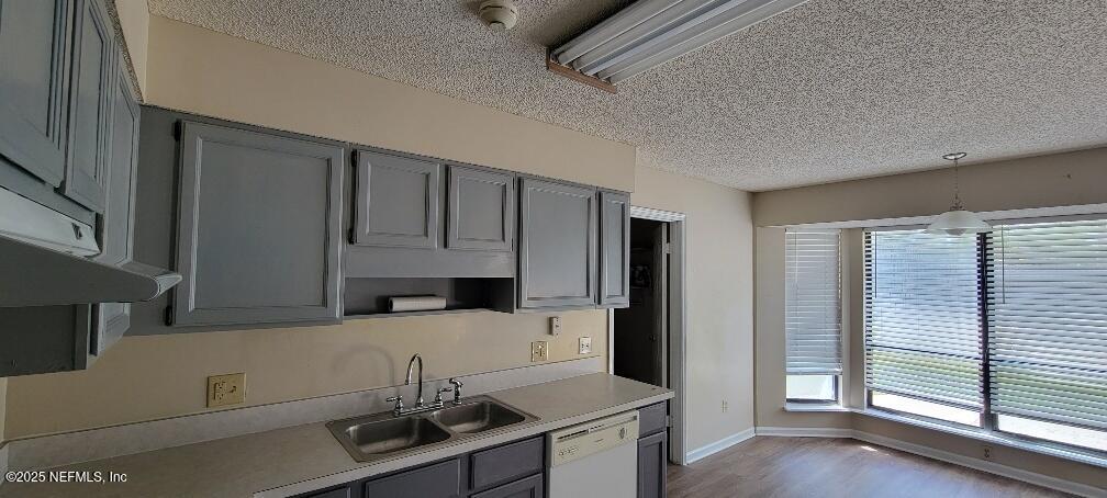 2321 Stonebridge Drive Orange Park, FL 32065 - Photo 6 of 21 a kitchen with stainless steel appliances a sink a stove a refrigerator and cabinets
