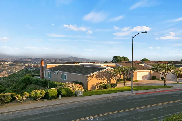 a view of a city street from a building