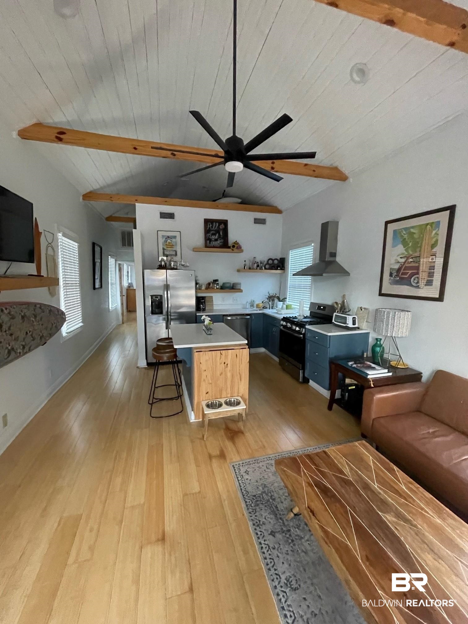 962 Savannah Street Mobile, AL 36604 - Photo 2 of 7 Living room with ceiling fan, light hardwood / wood-style flooring, lofted ceiling with beams, and wooden ceiling