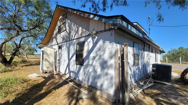 a house view with a backyard space