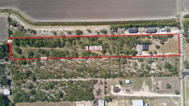 a house with trees in the background