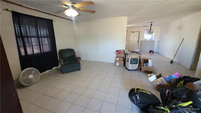 a kitchen with stainless steel appliances granite countertop a sink counter space cabinets and a large window
