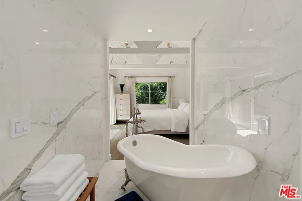 a bathroom with a sink and a bathtub