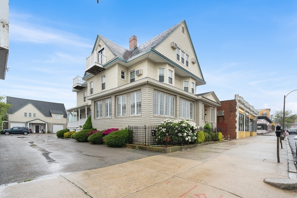 280 Broadway, Unit 5 Somerville, MA 02145 - Photo 11 of 13 a view of multiple houses with a street