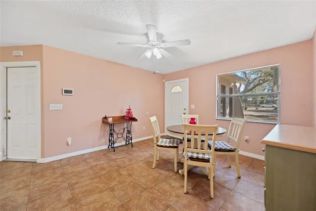 a view of a hallway with wooden shelves