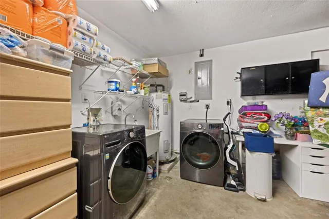 a room with furniture and large windows