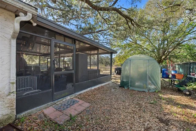 a view of a lake with a yard