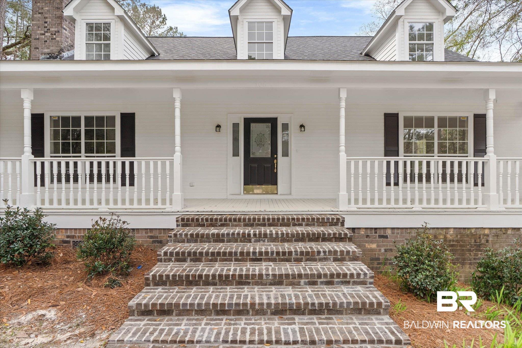 106 Melanie Loop Daphne, AL 36526 - Photo 2 of 45 Entrance to property featuring a porch and roof with shingles