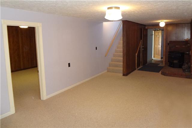 360 Beasley Branch Road Prospect, TN 38477 - Photo 16 of 20 a view of a livingroom with furniture and a ceiling fan