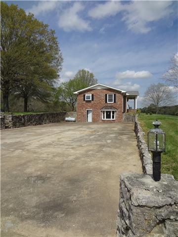 360 Beasley Branch Road Prospect, TN 38477 - Photo 5 of 20 a front view of a house with a yard