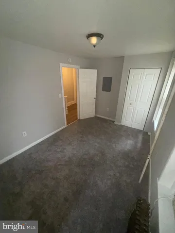 a view of empty room with windows