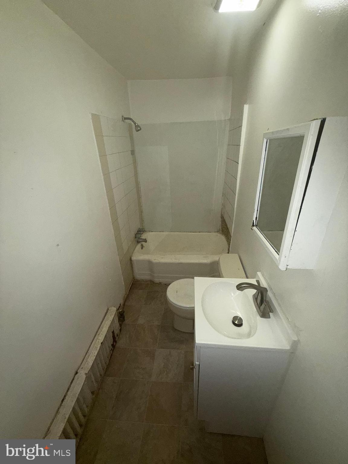 663 Kohn Street, Unit 2 Norristown, PA 19401 - Photo 17 of 23 a bathroom with a sink a toilet and shower